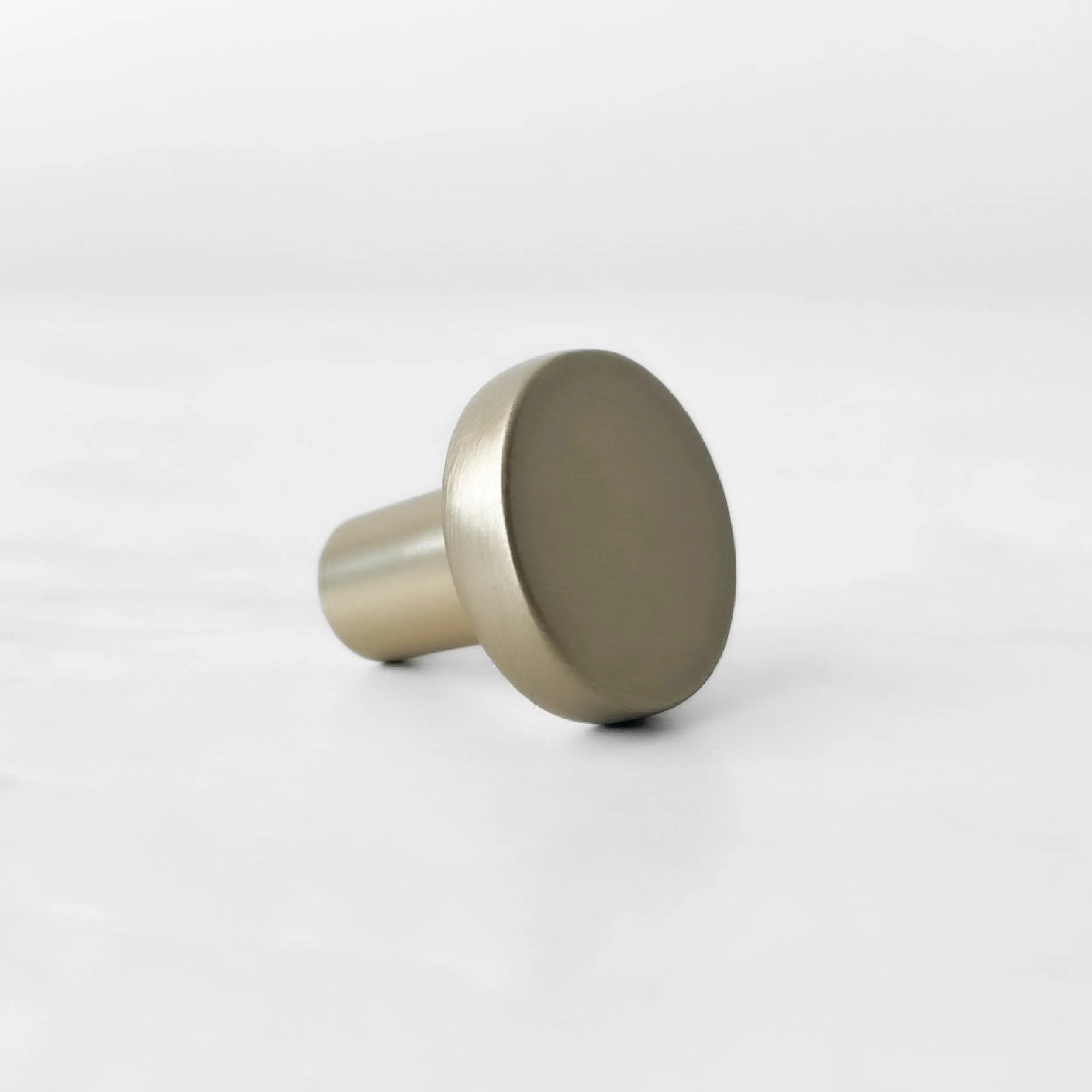 Clearance Knott, børstet messing 22 mm Håndtak